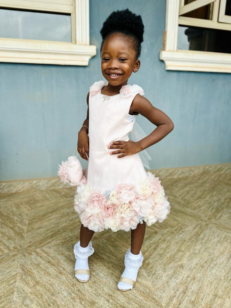 Little Girl’s Sleeveless Dress with handmade ruffled petals